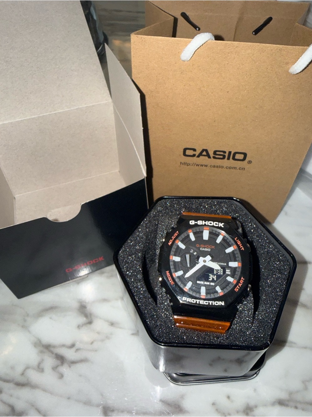 G-Shock Black Watch with Orange Accents and Orange Strap